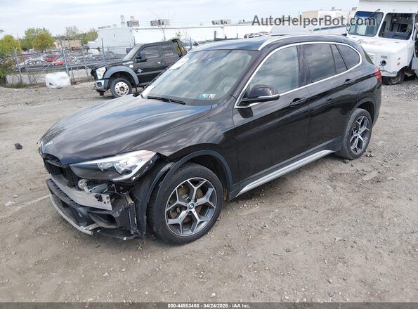 WBXHT3C57K5L90770 2019 BMW X1 Черный Передняя левая четверть