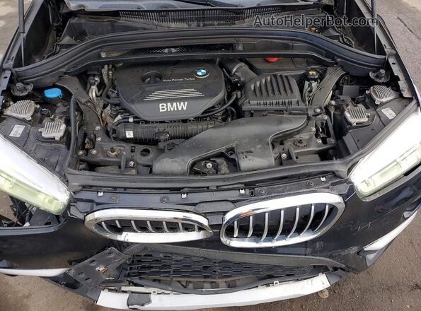 WBXHT3Z3XG4A48199 2016 BMW X1 Черный Вид задней части салона