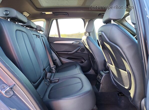 WBXJG7C01L5P35682 2020 BMW X1 Gray Вид задньої частини салону