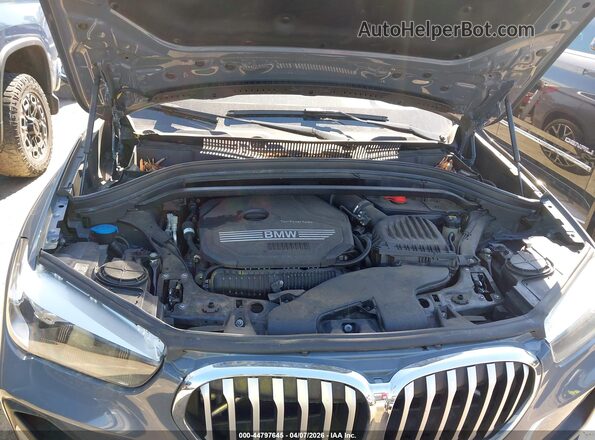 WBXJG7C09M5S08085 2021 BMW X1 Gray Rear view