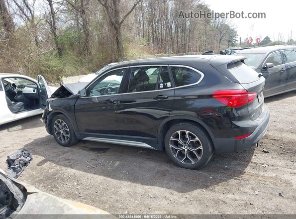 WBXJG9C01L5P86076 2020 BMW X1 Black Vista interior de 360 grados