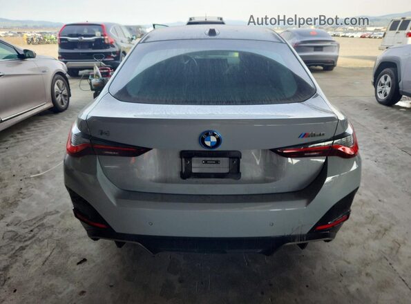 WBY33AW0XRFS33958 2024 BMW I4 Gray Vista trasera