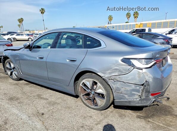 WBY43AW03RFS84206 2024 BMW I4 Gray Trasero izquierdo