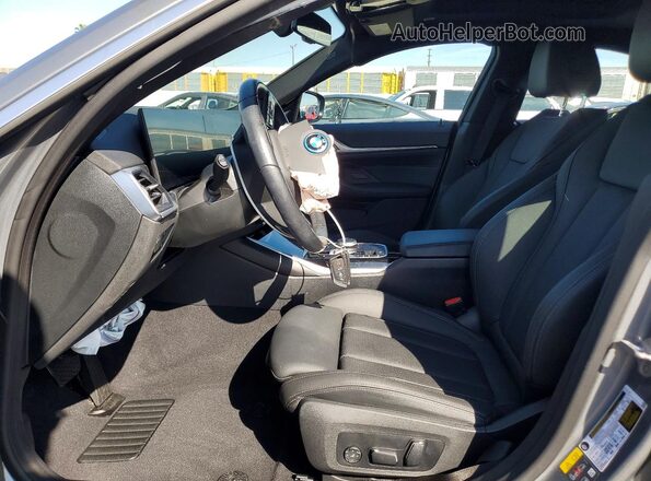 WBY43AW03RFS84206 2024 BMW I4 Gray Vista interior delantera