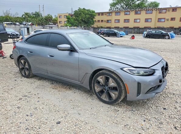 WBY43AW06PFP45038 2023 BMW I4 Gray Front right