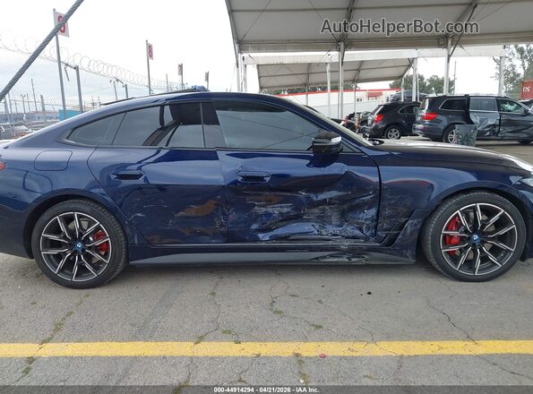 WBY73AW01PFP34493 2023 BMW I4 Синий Вид задней части салона