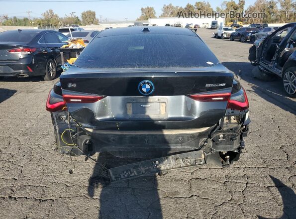 WBY73AW08PFP89068 2023 BMW I4 Black Rear view