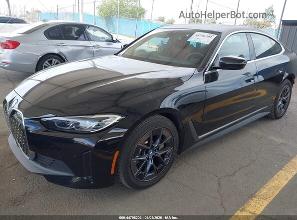 WBY73AW08PFP89703 2023 BMW I4 Black Vista tres cuartos delantera izquierda