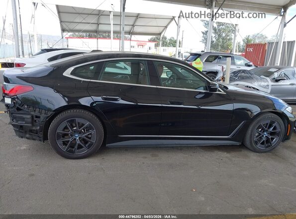 WBY73AW08PFP89703 2023 BMW I4 Black Vista interior de 360 grados