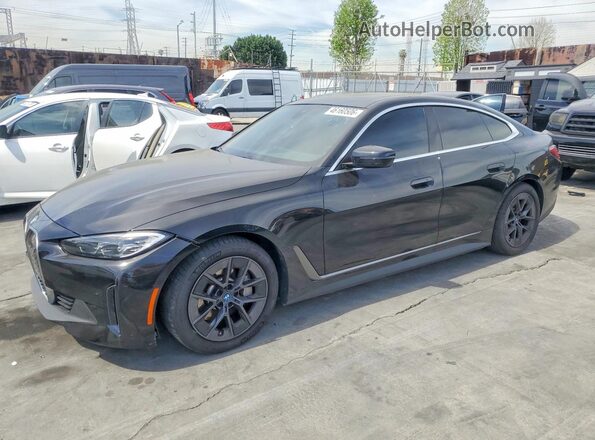 WBY73AW0XPFN82228 2023 BMW I4 Black Առջևի ձախ երեք քառորդ տեսարան