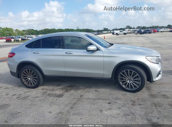 WDC0J4KBXKF497264 2019 MERCEDES-BENZ GLC 300 COUPE Серебряный Вид задней части салона