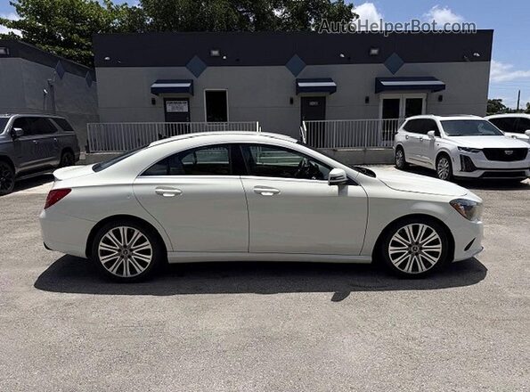 WDDSJ4EB0JN570193 2018 MERCEDES-BENZ CLA-CLASS White VIN sticker view