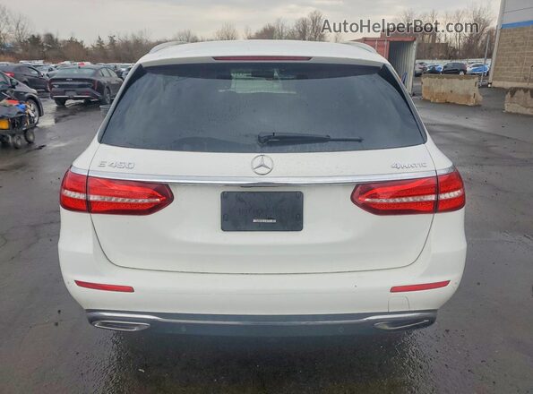 WDDZH6JB2KA525969 2019 MERCEDES-BENZ E White Widok z tyłu