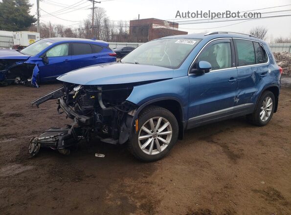 WVGSV7AX5HK004572 2017 VOLKSWAGEN TIGUAN Blue Przód lewy