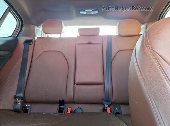 ZASPAKBN9N7D28748 2022 ALFA ROMEO STELVIO Красный Вид задних сидений