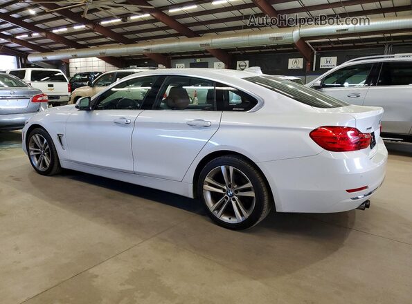 WBA4C9C51GG136141 2016 BMW OTHER Белый Задняя правая четверть
