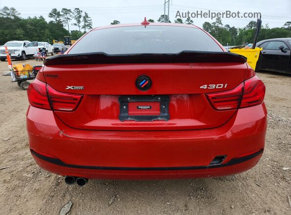 WBA4J3C56KBL06339 2019 BMW OTHER Red Vista interior delantera