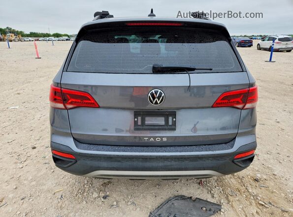 3VVDX7B21NM002706 2022 VOLKSWAGEN TAOS Серый Вид салона спереди