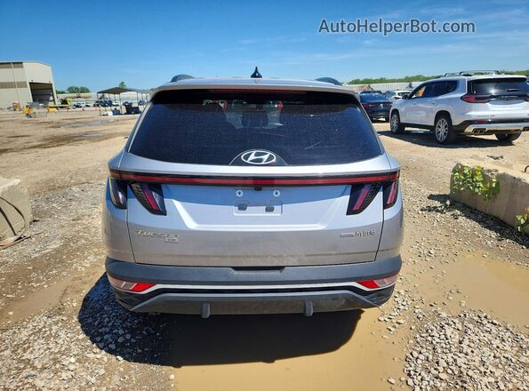 KM8JBCA14NU030783 2022 HYUNDAI TUCSON Серебряный Вид салона спереди