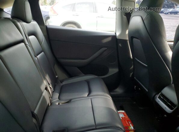 7SAYGAEE2SF239064 2025 TESLA MODEL Черный Вид задней части салона