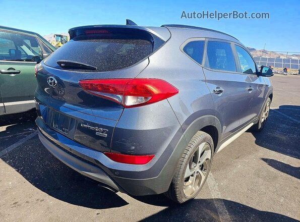KM8J3CA23JU753508 2018 HYUNDAI TUCSON Серый Вид спереди