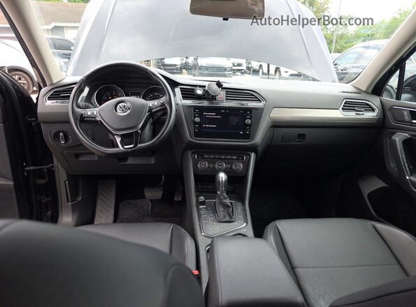 3VV3B7AX5JM078365 2018 VOLKSWAGEN TIGUAN Black Vista de los asientos traseros