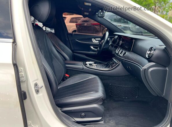 WDDZF4KB0KA606543 2019 MERCEDES-BENZ E White Vista de los asientos traseros