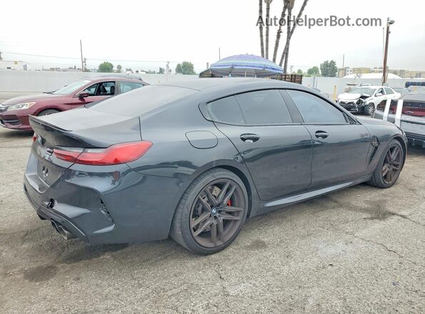 WBSGV0C02NCG90430 2022 BMW M8 Black Front right