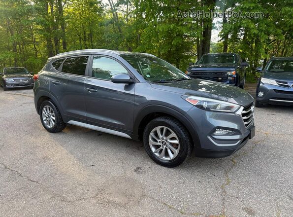 KM8J3CA40JU601333 2018 HYUNDAI TUCSON Серый Передняя левая четверть