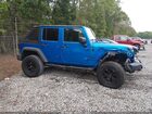 2016 Jeep Wrangler Unlimited Sport Blue vin: 1C4BJWDG7GL158019