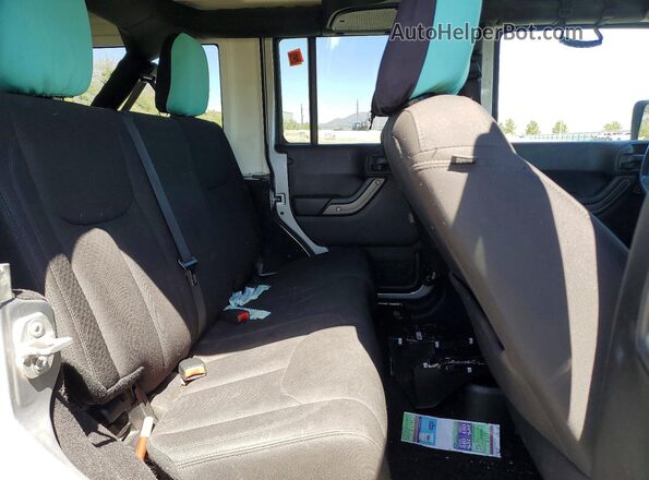 1C4HJWDG7GL283242 2016 JEEP WRANGLER Gray Vista interior trasera