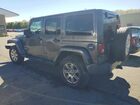 2016 Jeep Wrangler Unlimited Sahara Серый vin: 1C4HJWEG2GL335309