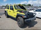 2023 Jeep Wrangler 4-door Willys 4x4 Yellow vin: 1C4HJXDNXPW523094