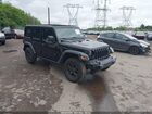 2023 Jeep Wrangler 4-door Willys 4x4 Black vin: 1C4HJXDNXPW592884