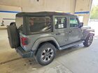 2018 Jeep Wrangler Unlimited Sahara Серый vin: 1C4HJXEN7JW262111