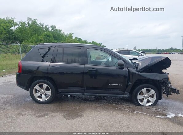 1C4NJCBA4GD675086 2016 JEEP COMPASS Black Vista interior trasera