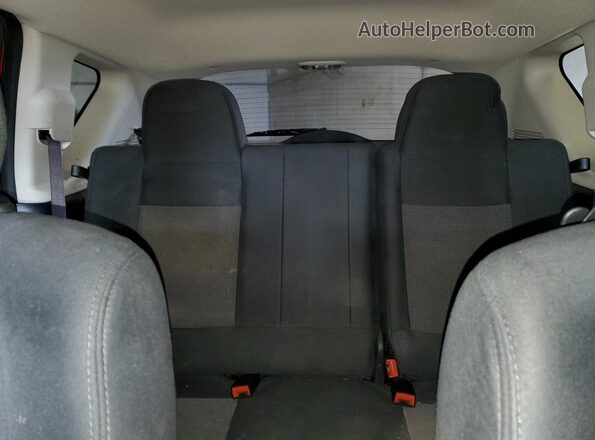 1C4NJDBB4GD687107 2016 JEEP COMPASS Red Rear seats view