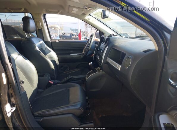 1C4NJDEB0GD614120 2016 JEEP COMPASS Черный Вид салона спереди