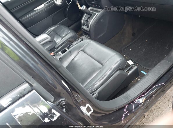 1C4NJDEB9GD588097 2016 JEEP COMPASS Черный Вид салона спереди
