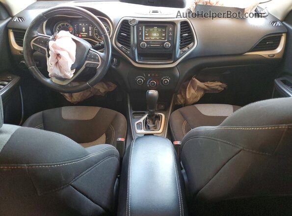 1C4PJLAB5GW346887 2016 JEEP CHEROKEE Темно-бордовый Вид панели приборов
