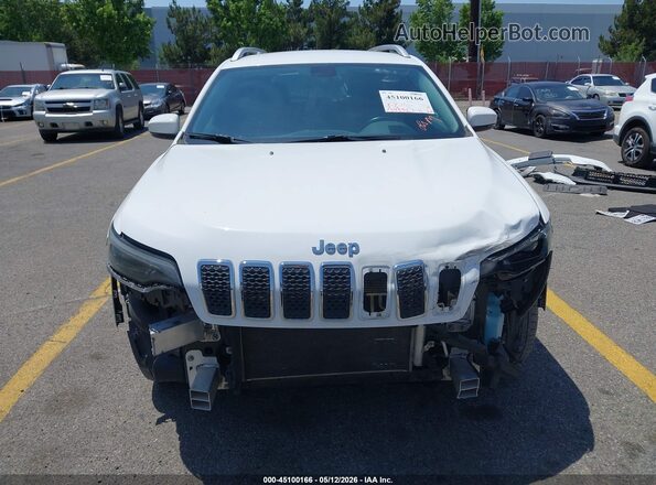 1C4PJLLX0KD305290 2019 JEEP CHEROKEE White Widok wnętrza z tyłu