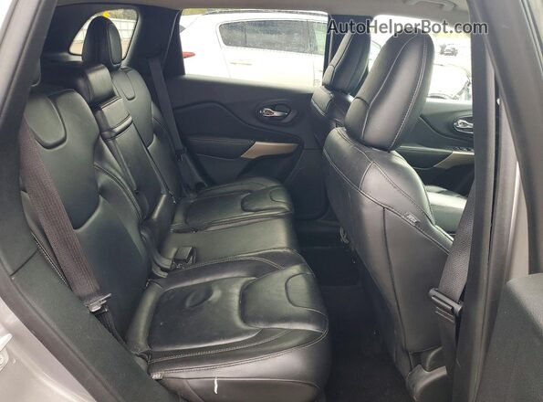 1C4PJMDBXHD240899 2017 JEEP CHEROKEE Silver უკანა სალონის ხედი