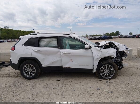 1C4PJMMX7MD234810 2021 JEEP CHEROKEE White Widok wnętrza z tyłu