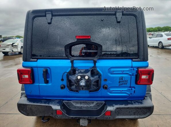 1C4PJXDG1RW305884 2024 JEEP WRANGLER Blue Вид ззаду