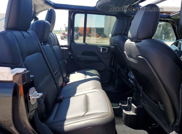 1C4PJXEG8RW247724 2024 JEEP WRANGLER Black Вид задньої частини салону