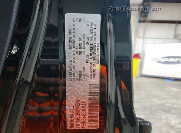 1C4PJXENXSW525396 2025 JEEP WRANGLER Black VIN sticker view