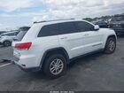 2019 Jeep Grand Cherokee Laredo E 4x4 Белый vin: 1C4RJFAG6KC793177