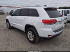 2019 Jeep Grand Cherokee Laredo E 4x4 Белый vin: 1C4RJFAG9KC537020