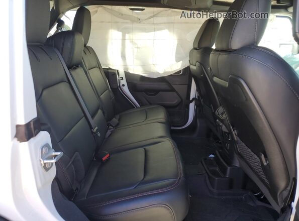 1C4RJXFN0SW512860 2025 JEEP WRANGLER Белый Вид задней части салона