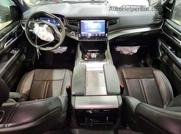 1C4SJSBP4TS163772 2026 JEEP GRAND Black Vista del salpicadero